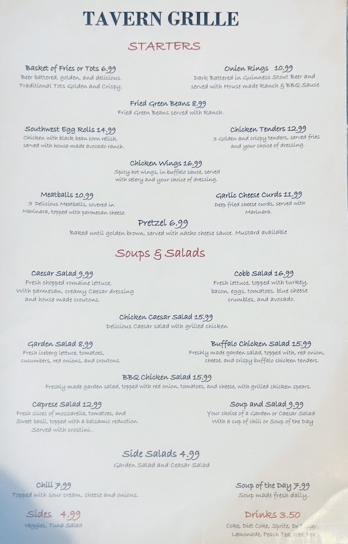 Comfort food plates beside drinks at a laid-back grill.